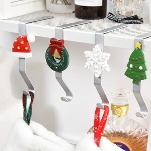 Juephe 4 Piece Christmas Metal Stocking Holders for the Mantel